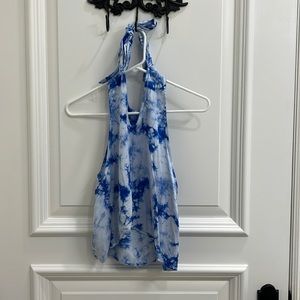 Flattering, flowy blue and white tie dye tank top, ties behind the neck